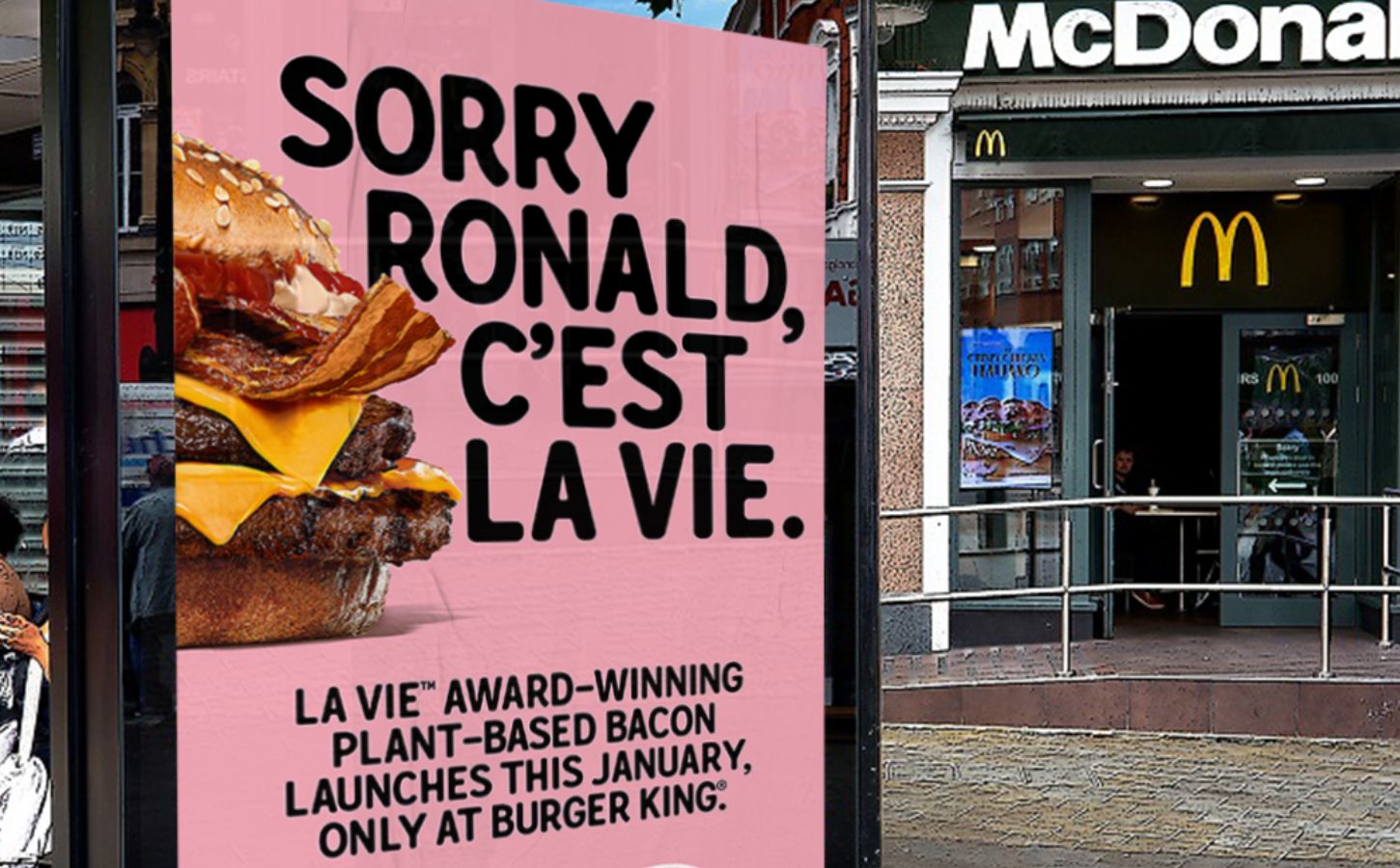 A LA VIE bus stop advert outside McDonald's with the words: "Sorry Ronald, C'est La Vie" written next to a plant-based burger