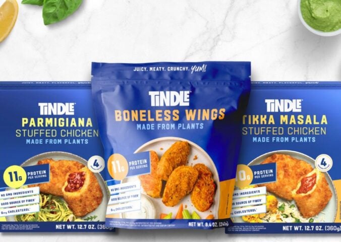 Photo shows the packaging of three core TiNDLE products: Parmigiana flavor Stuffed Chicken, Boneless Wings, and Tikka Masala Stuffed Chicken (L-R)
