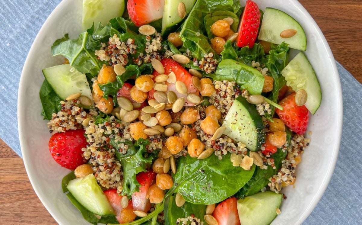 vegan spring lunch ideas strawberry quinoa salad with chickpeas, kale, and spinach