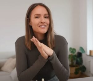 Vegan content creator Alexandra Andersson in a still from a video on whole food, plant-based recipes